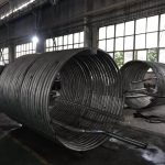 Titanium tubing formed into large factory coils