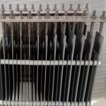 Coated titanium electrode plate assembly with titanium hangers