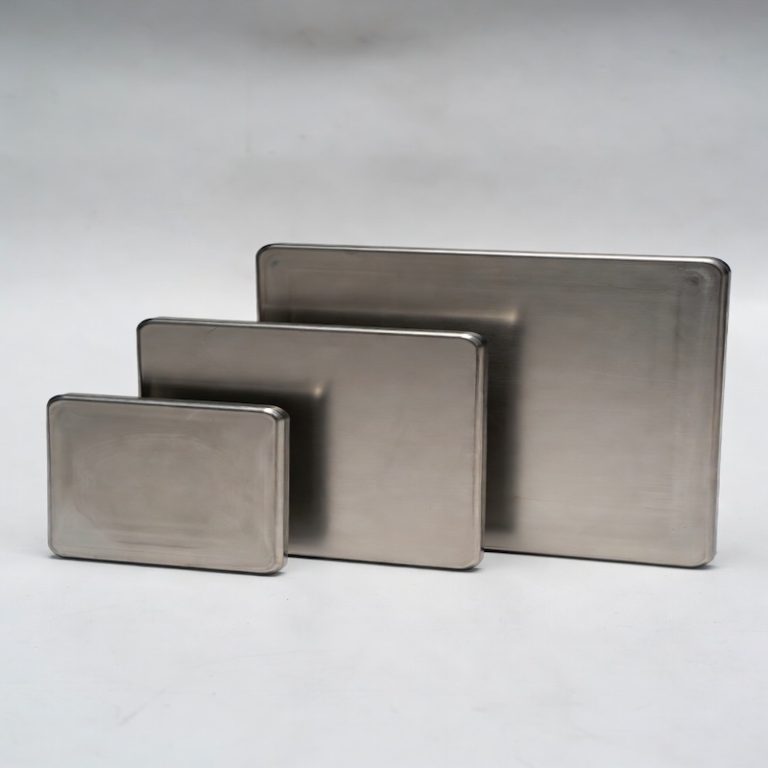 Various sizes of precision titanium build plates showing customization options for different metal 3D printers