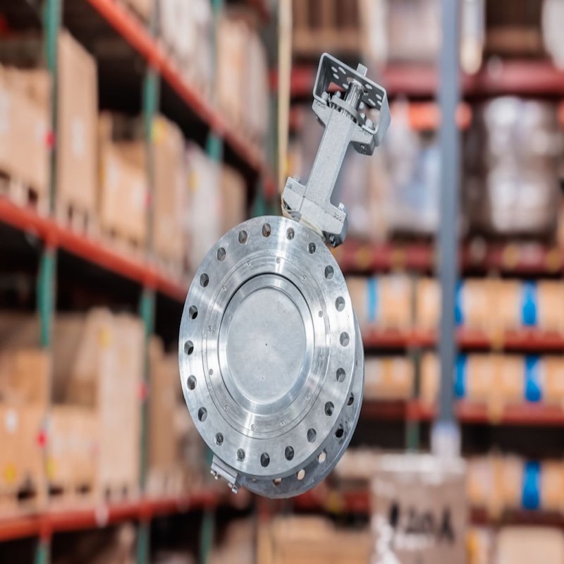 Titanium butterfly valve with a lever handle, seen from the disc face