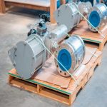 Actuated titanium valves with flanged connections, strapped on a pallet