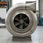 Titanium blower close-up showing motor coupling, shaft and double-layer base design for chemical industry use