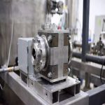 Titanium pump rear-pull-out design demonstration showing shaft, coupling and bearing assembly for easy maintenance in chemical process applications