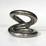 Titanium heat exchanger coil made from coiled titanium tube
