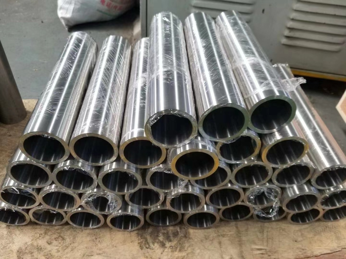 Titanium tube ends for ASTM B338 condenser and heat exchanger service