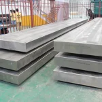 Titanium clad plates and titanium clad steel plates stacked for industrial fabrication