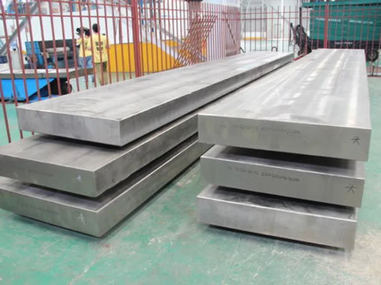 Titanium clad plates and titanium clad steel plates stacked for industrial fabrication