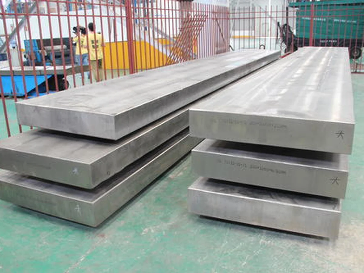 Titanium clad plates and titanium clad steel plates stacked for industrial fabrication