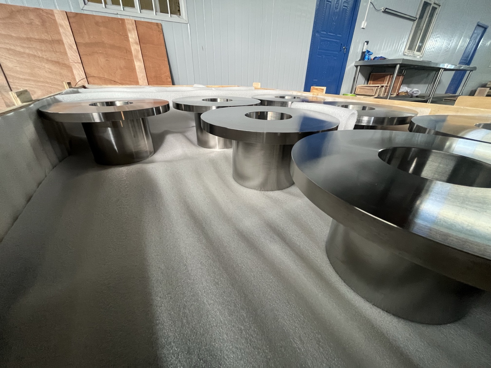 Machined titanium forgings on the factory floor at Beiyu Titanium