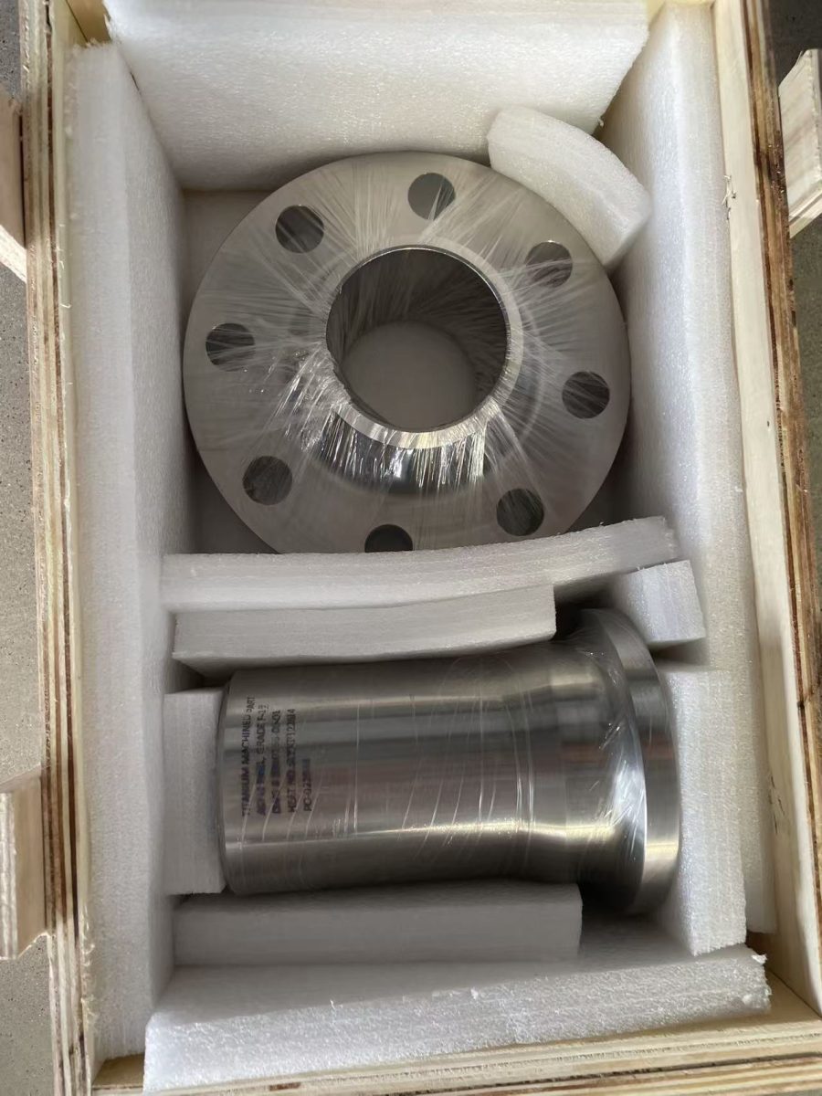 Titanium flange and machined part in export crate with foam protection