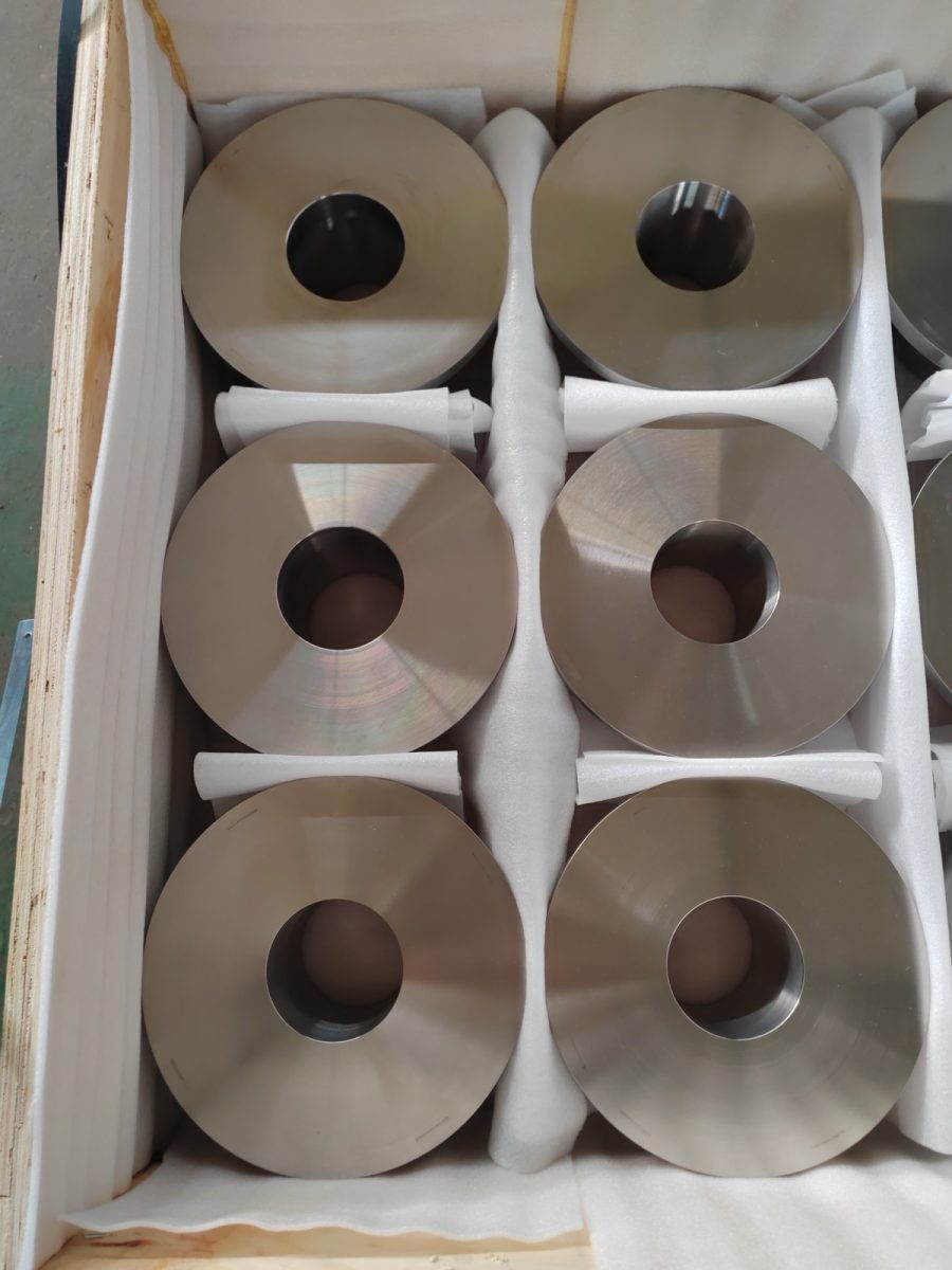 Forged titanium sleeves packed in an export crate