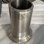 Titanium machined part marked ASTM B381 Grade 12 with drawing and heat number