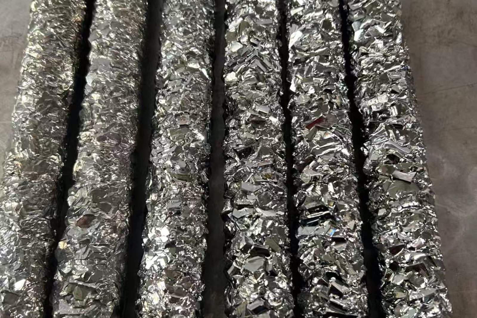 Titanium bar with as forged surface before peeling and grinding