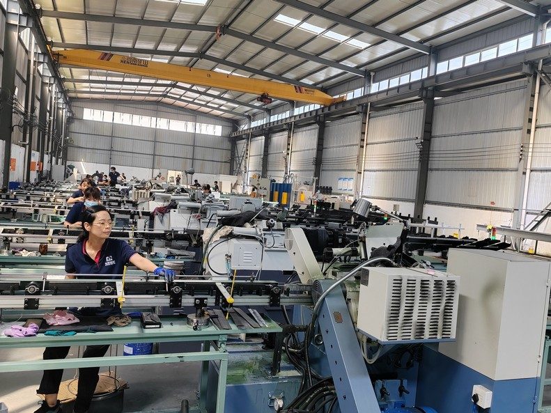Centerless grinding line at the Beiyu bar mill, where titanium bar is ground to final diameter
