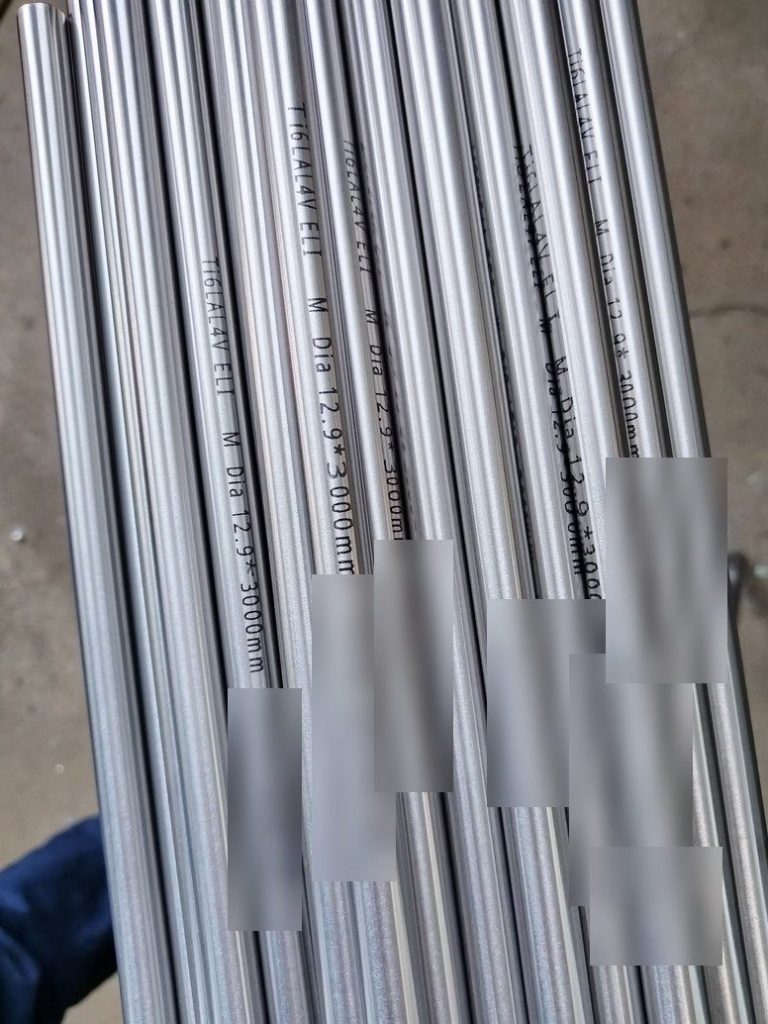 Titanium Grade 23 ELI bar marked with grade, annealed condition and size, with the heat number masked