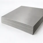 Stack of titanium sheet showing the cut edges, illustrative studio image of the product form