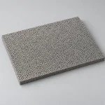 Sintered porous titanium plate, illustrative studio image of the product form