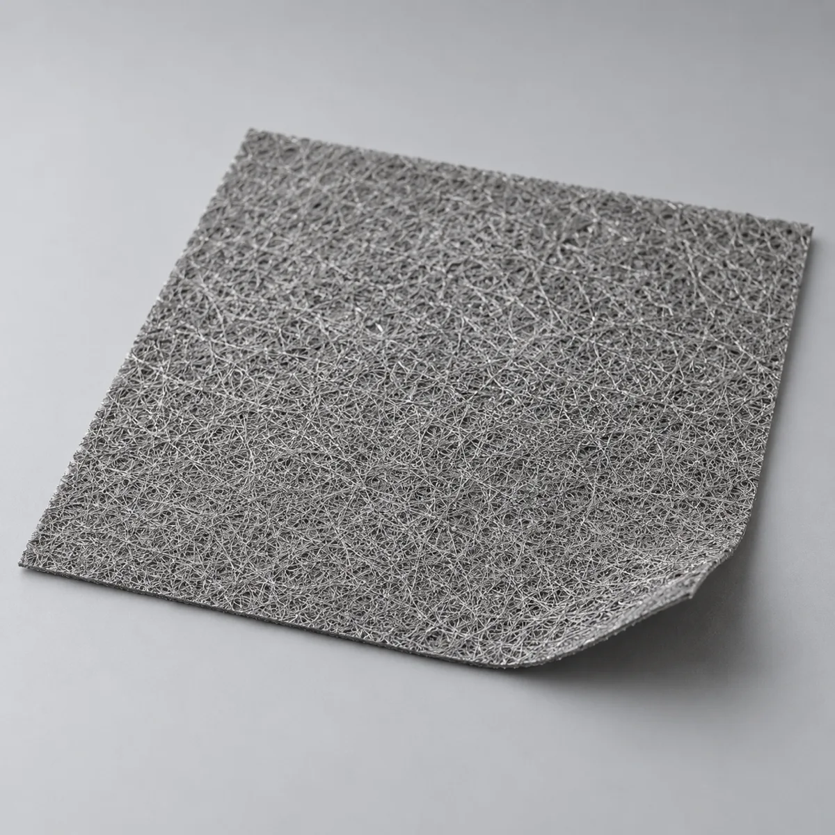 Titanium fibre sintered felt, illustrative studio image of the product form