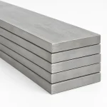 Titanium flat bar stacked to show the rectangular solid cross section, illustrative studio image of the product form