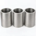 Large diameter titanium pipe sections with the bore and wall visible, illustrative studio image of the product form