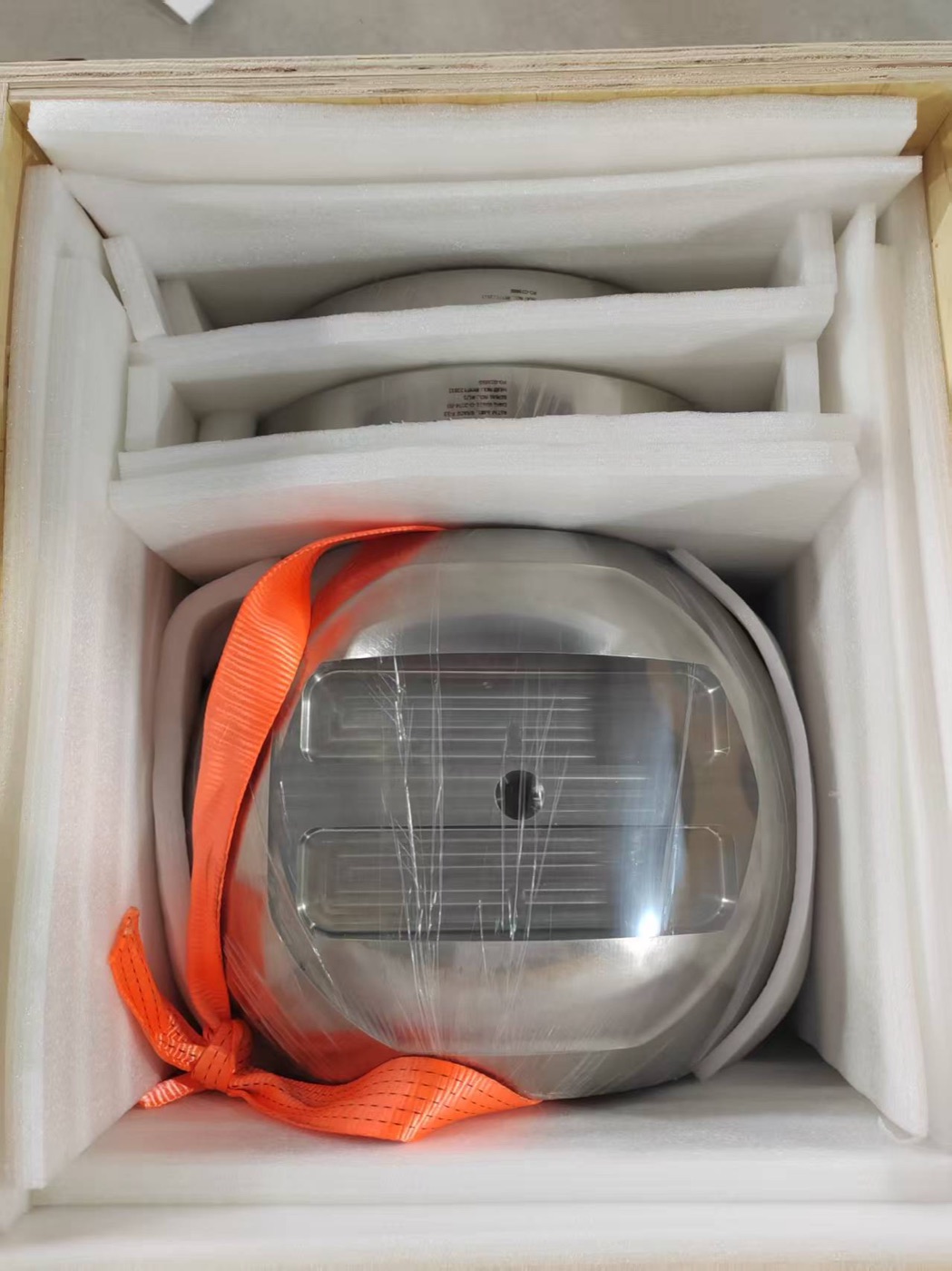 Titanium components in foam-lined export cases with strapping